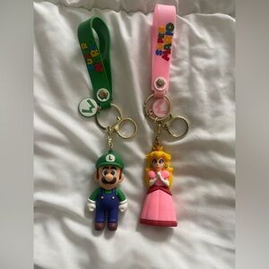 Nintendo Luigi & Princess Peach Keychain Duo - Green, Pink, Yellow